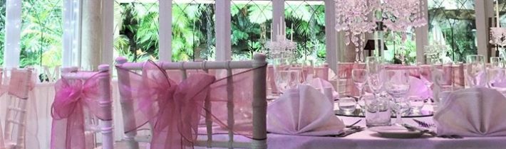 Draped in pink lighting at Tamborine Gardens Wedding and Function Resort, setting up our…
